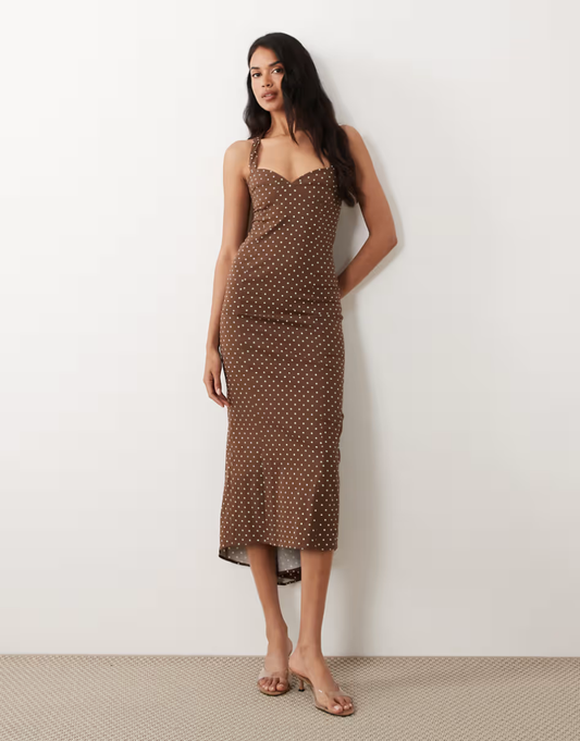 Fluted hem halter neck dress in brown polka dots